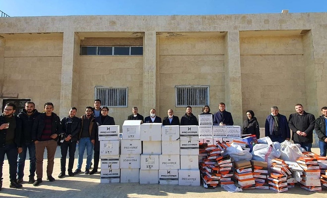 Suriyeli öğrencilere kışlık giyim ve gıda yardımı dağıtıldı